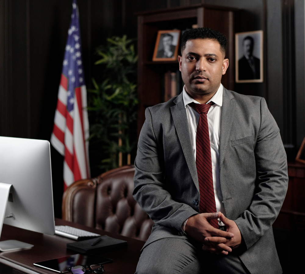 Workplace Lawyer in His Office Looking At You - (1000 x 900)