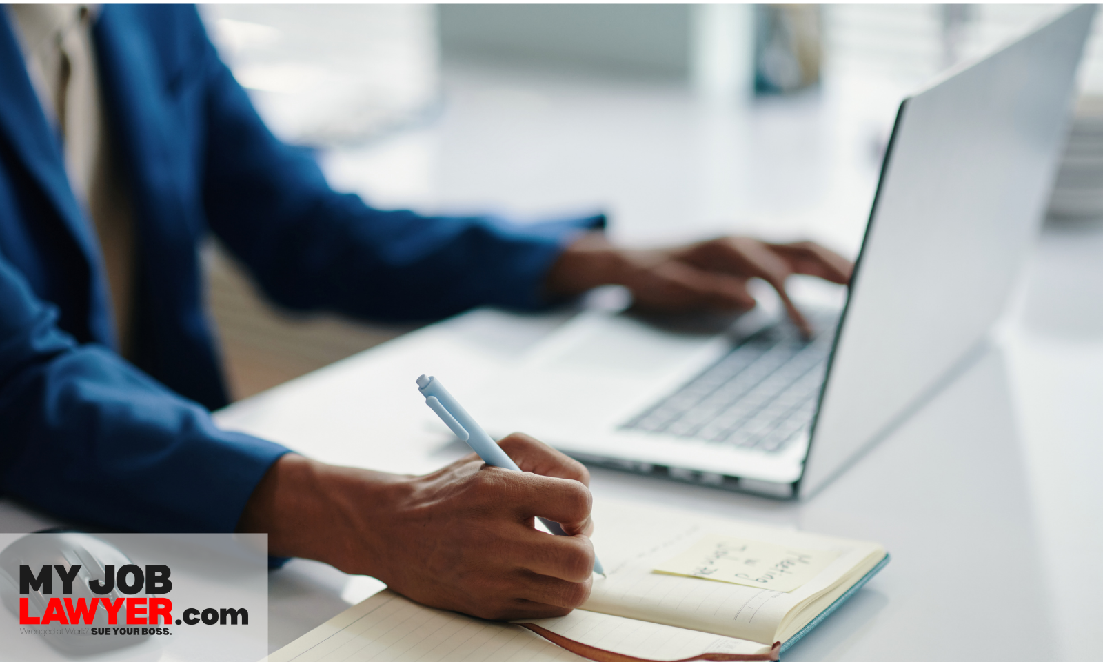 Employee documenting workplace discrimination by writing notes and saving records