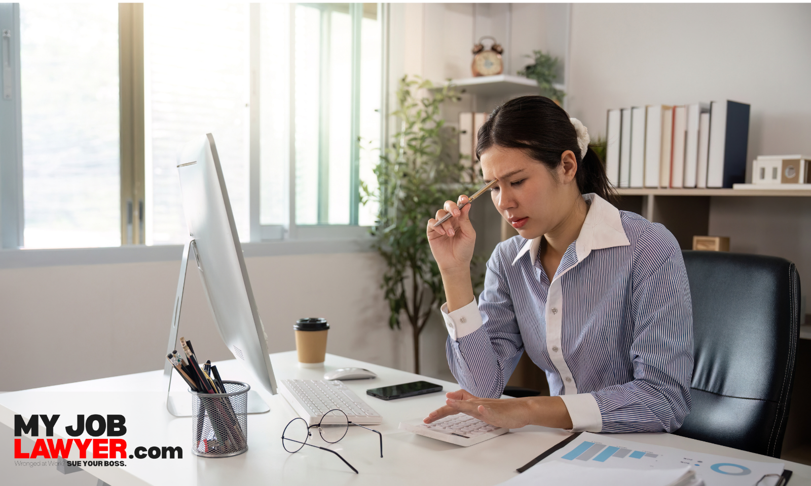 Injured employee stressed at work while wondering “Can You Collect Workers' Comp After Being Fired?”