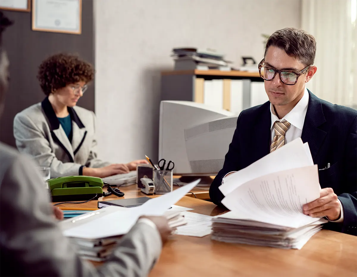 vintage-style-people-working-office-with-computers-img